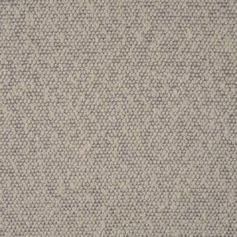 Beige speckled fabric texture, Ditre Italia princess 901 (p) range, woven with raised gray dots, neutral tonal variation.